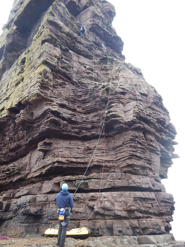 Scottish sea stacks - climbing the first pitch of Am Buachaille the Herdsman